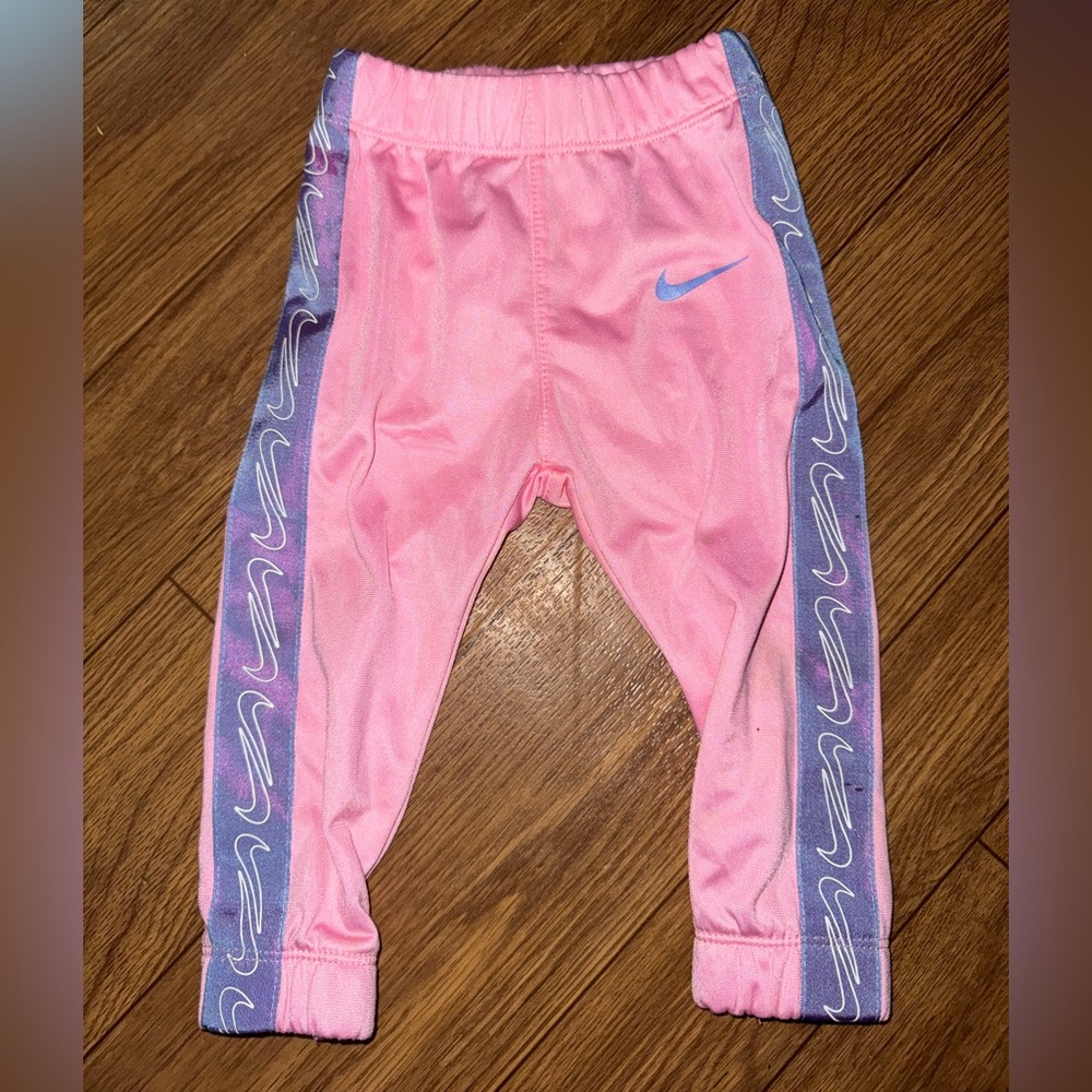 Nike 12 Month Pink Track Pant with Purple Nike Logo Down Leg and Arm